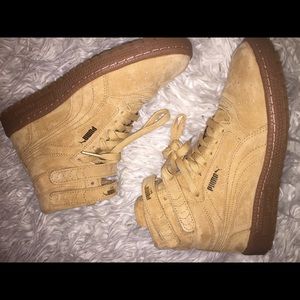Tan suede pumas